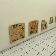 Wand mit Spielstationen